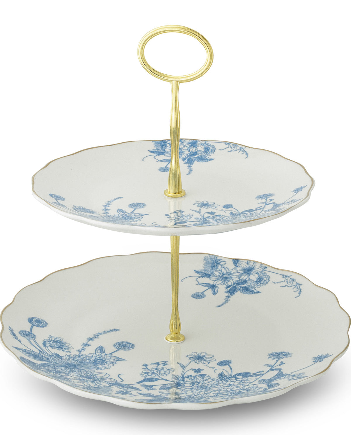 A two-tiered serving stand with a white porcelain base decorated with blue floral toile patterns and a gold-finished metal frame and handle.