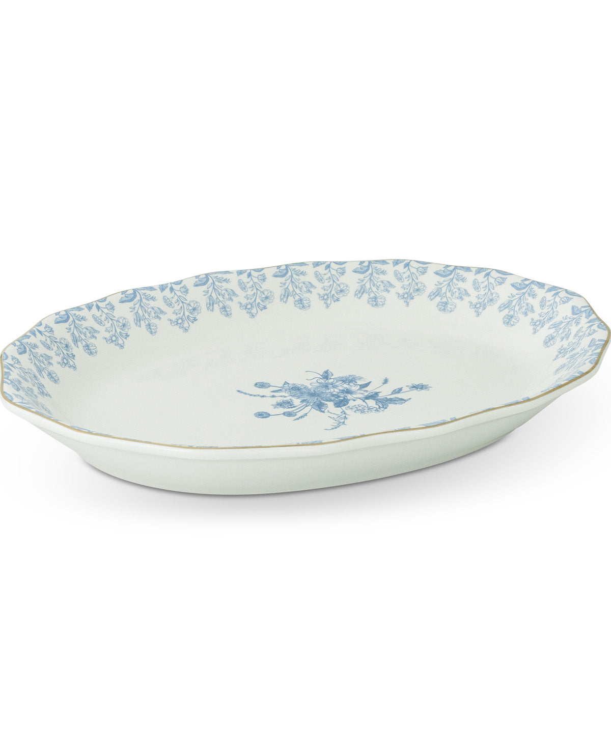 An oval ceramic serving dish with a blue floral pattern on the rim and center, shown on a clean white background.