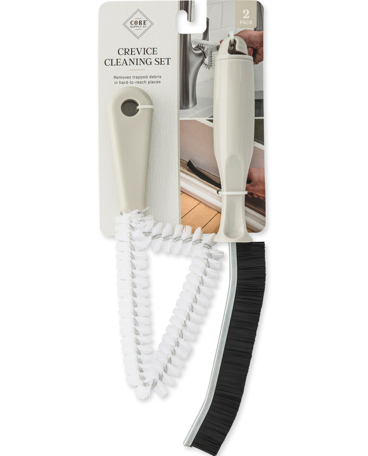 CREVICE CLEANING SET with two plastic crevice brushes, one white and one black, attached to a retail backing card.