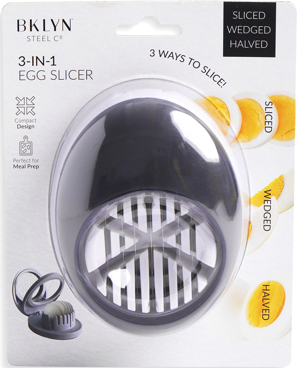 BKlyn Steel 3-in-1 egg slicer in its retail packaging, featuring a dark gray plastic slicer inside a clear oval shell on a white backing card with product details.