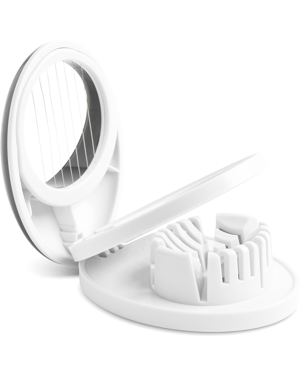 A white plastic multi-slice food cutter shown open, with a circular slicing guard on one side and a set of angled cutting blades on the base, photographed on a clean white background.