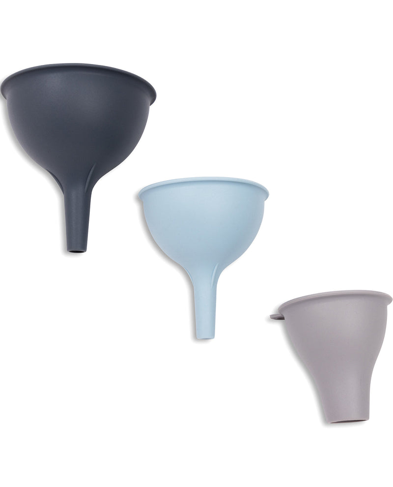 Three matte plastic funnel shapes in dark charcoal gray, light blue, and pale lavender, arranged diagonally on a solid white background.