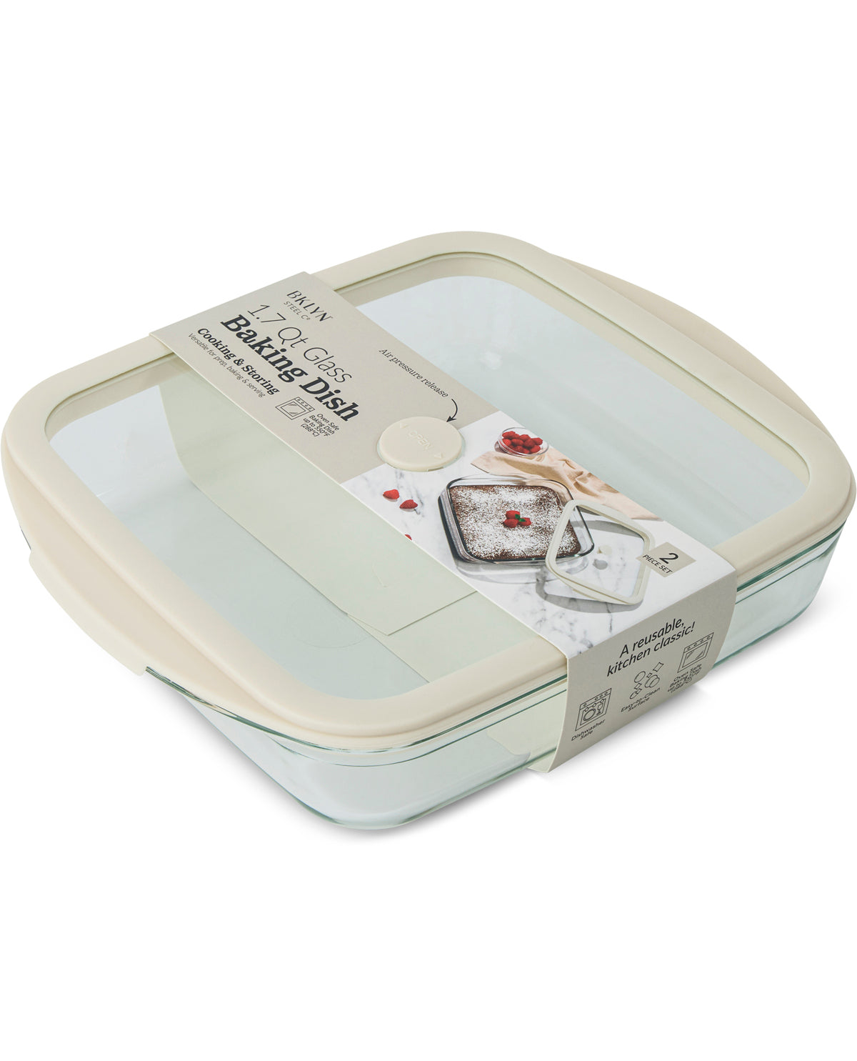 A rectangular glass baking dish with a cream-colored lid and a paper band label, photographed on a clean white background.