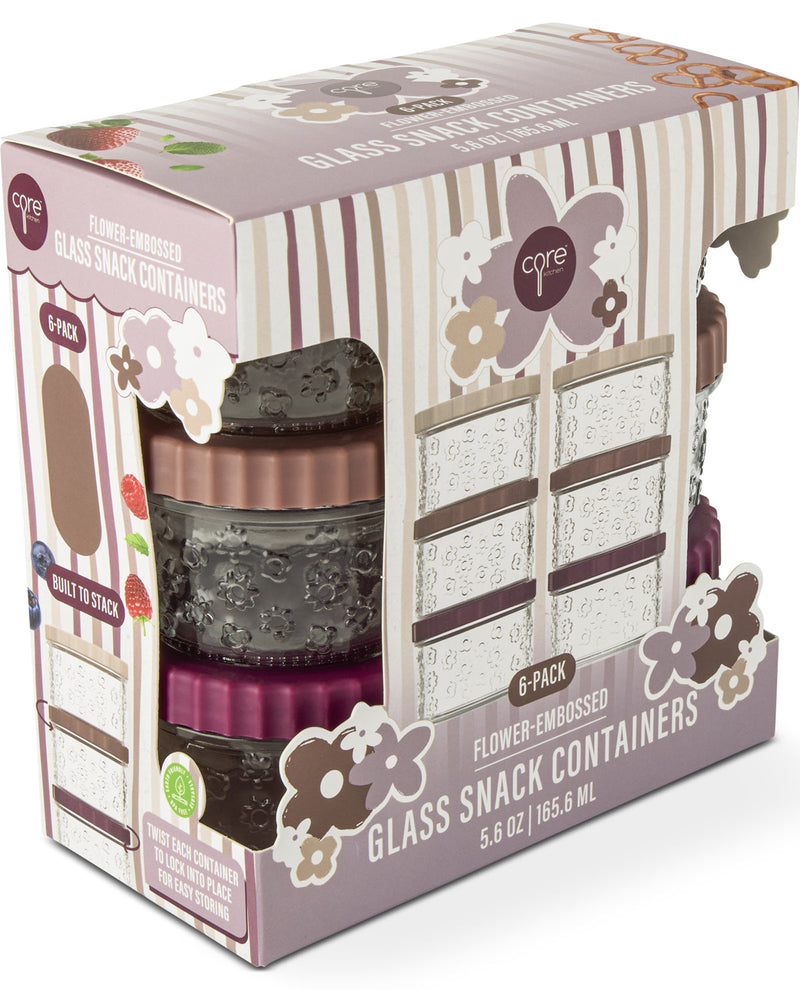 A 6-pack of Core Family Values flower-embossed glass snack containers in a matching display box. The containers come in assorted colors including brown, dark gray, and magenta, and are decorated with floral patterns.