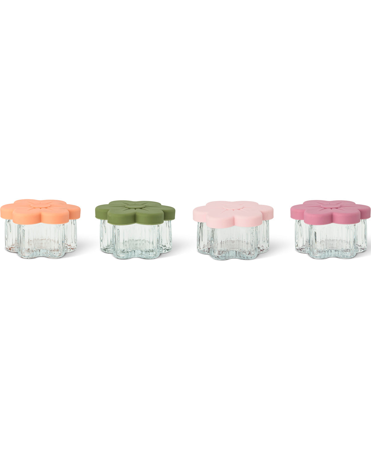Four small clear plastic storage containers with scalloped edges and flower-shaped lids in peach, olive green, light pink, and mauve, arranged in a row on a white background.