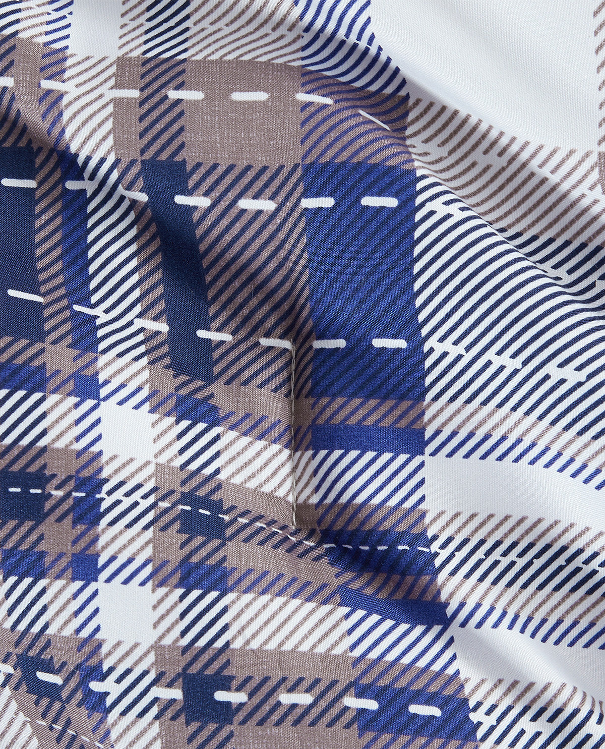 Close-up of a plaid fabric pattern with navy blue, white, and beige stripes, showing stitched details.