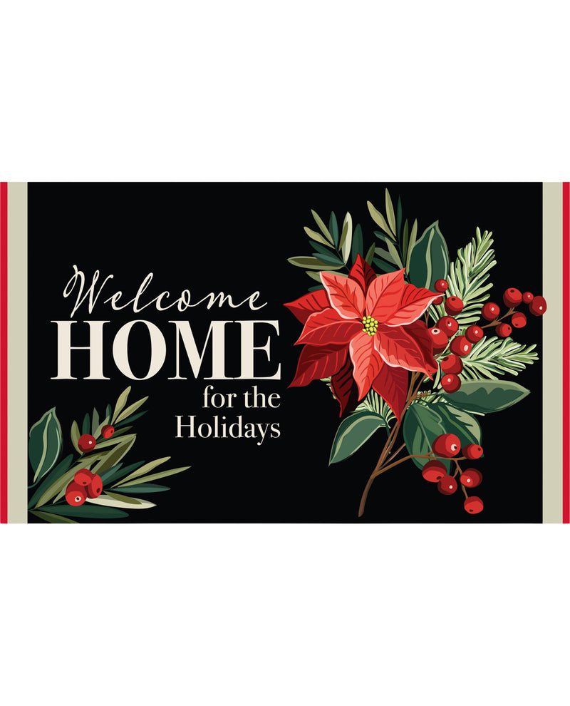A rectangular holiday sign with a black background and the phrase 'Welcome HOME for the Holidays' in white script and serif text. The design includes red poinsettias, green leaves, pine branches, and clusters of red berries, with narrow red side borders.