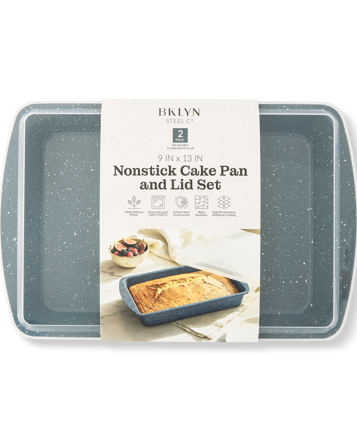 A 9x13-inch nonstick cake pan and lid set by Brooklyn Steel, featuring a speckled dark gray exterior and a cream-colored paper label wrapped around the center, displayed on a clean white background.