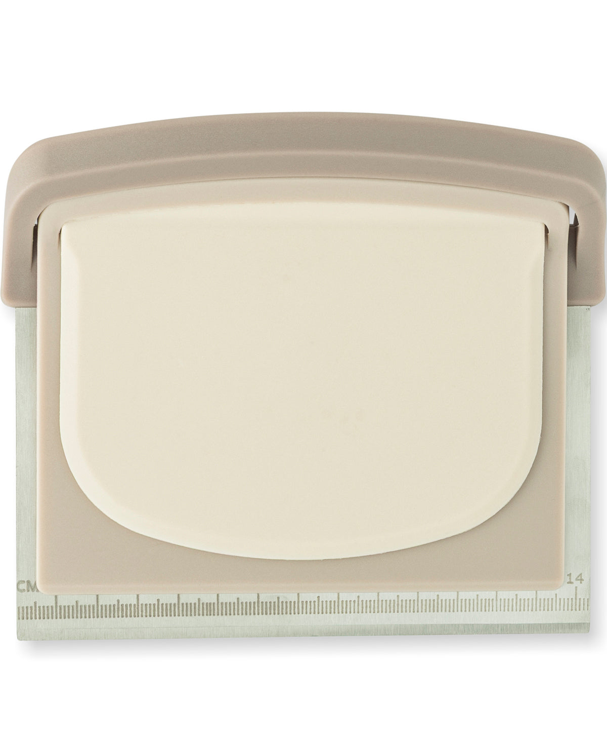 A beige and off-white plastic craft punch tool with a ruler scale visible along the bottom edge, set against a plain white background.