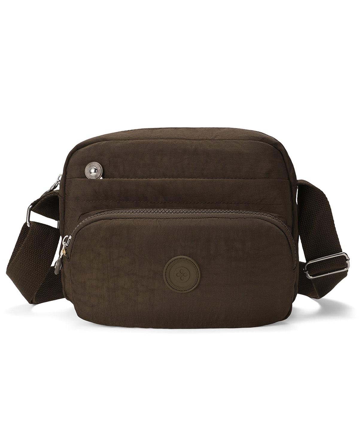 A dark brown crossbody bag with a textured nylon fabric, featuring a front zippered pocket, a circular metal logo button, and an adjustable shoulder strap, shown on a white background.