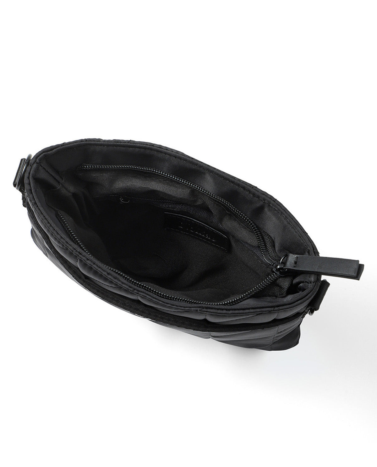 Black nylon pouch bag shown from an overhead angle, displaying its interior zippered compartment and black fabric lining on a white background.
