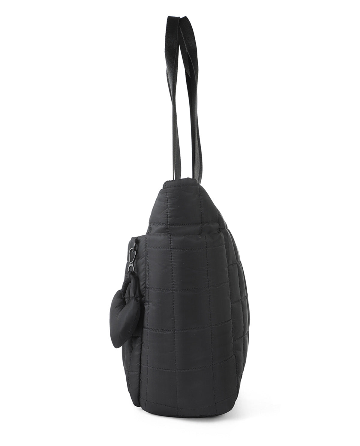A black quilted puffer tote bag with a long shoulder strap and a small matching pouch attached on the side, shown from a side profile view against a plain white background.