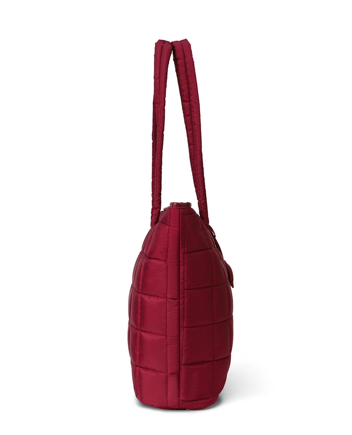 A dark red quilted puffer tote bag shown from the side profile against a clean white background.