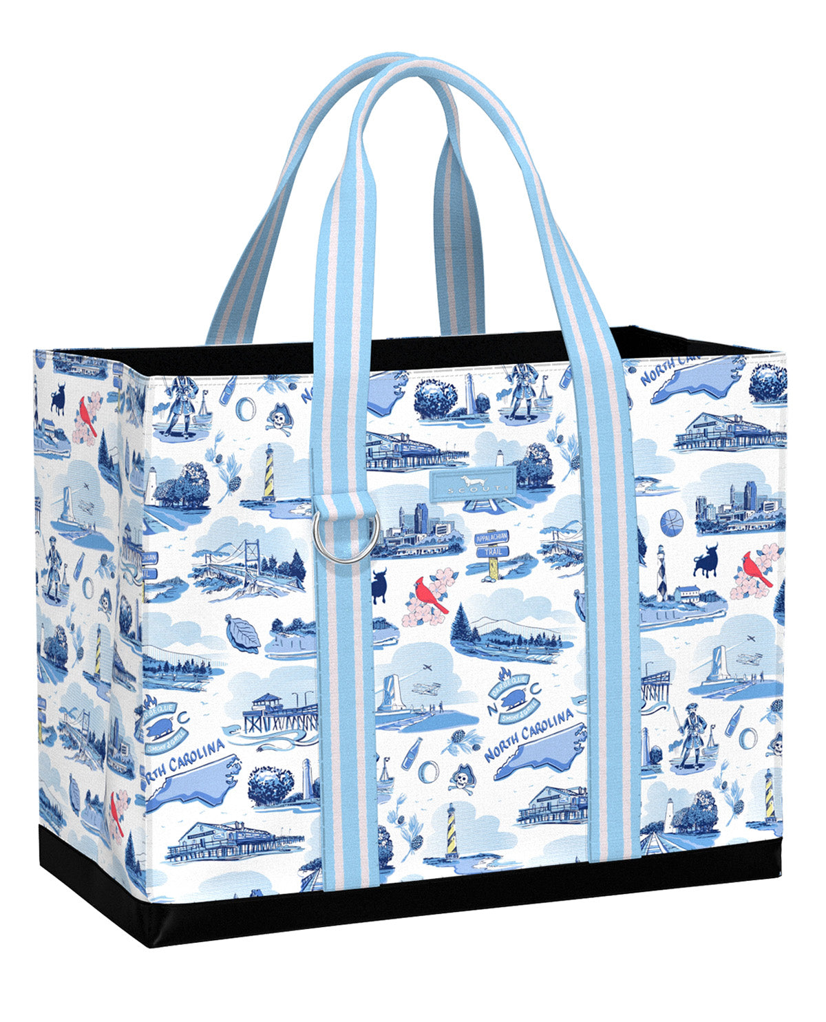 A tote bag featuring a blue and white South Carolina-themed toile pattern with light blue and white striped handles, black trim, and a silver metal ring detail on the front.