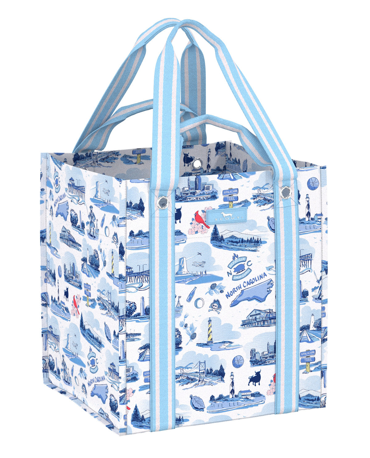 A reusable tote bag with a blue and white North Carolina coastal illustration pattern, featuring light blue and white striped handles, shown on a plain white background.