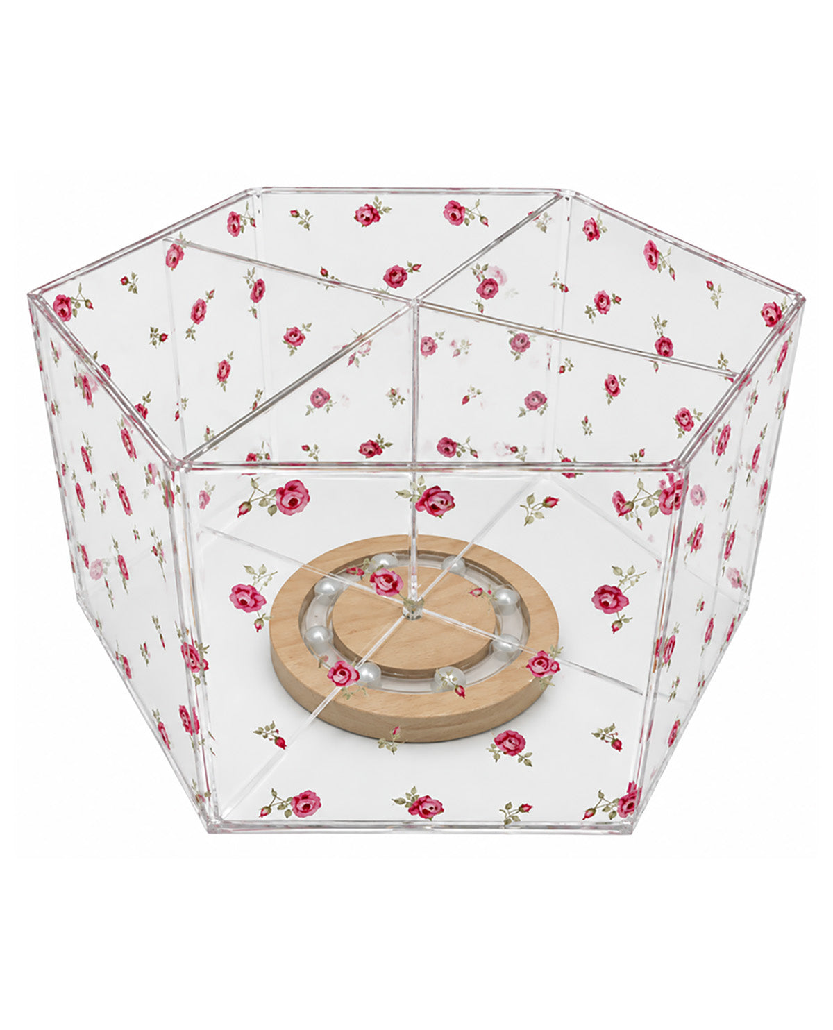 A hexagonal clear acrylic or glass container with a pink and green rose pattern printed on the sides, featuring a round wooden base with built-in LED lights.