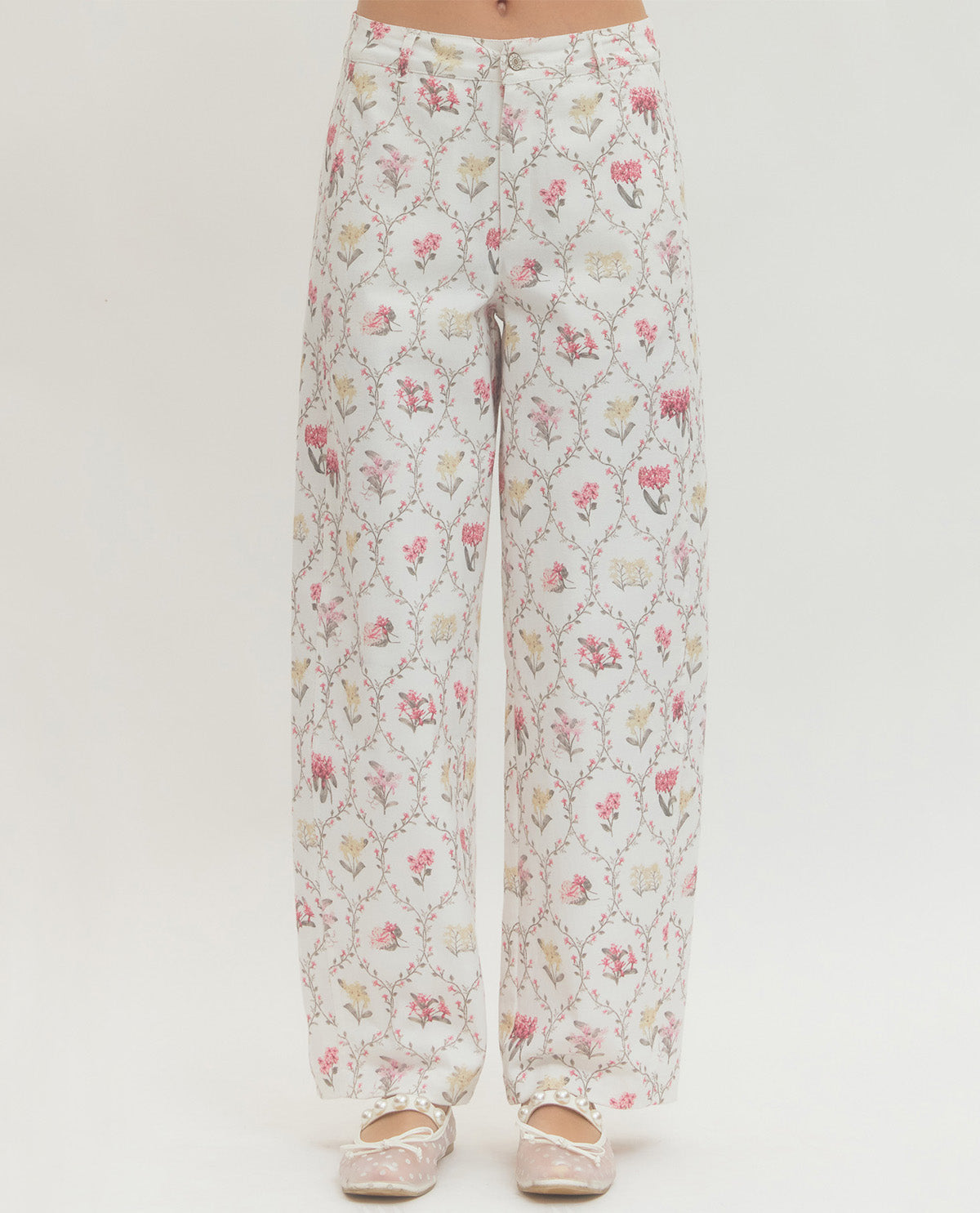 Floral patterned pants on a white background