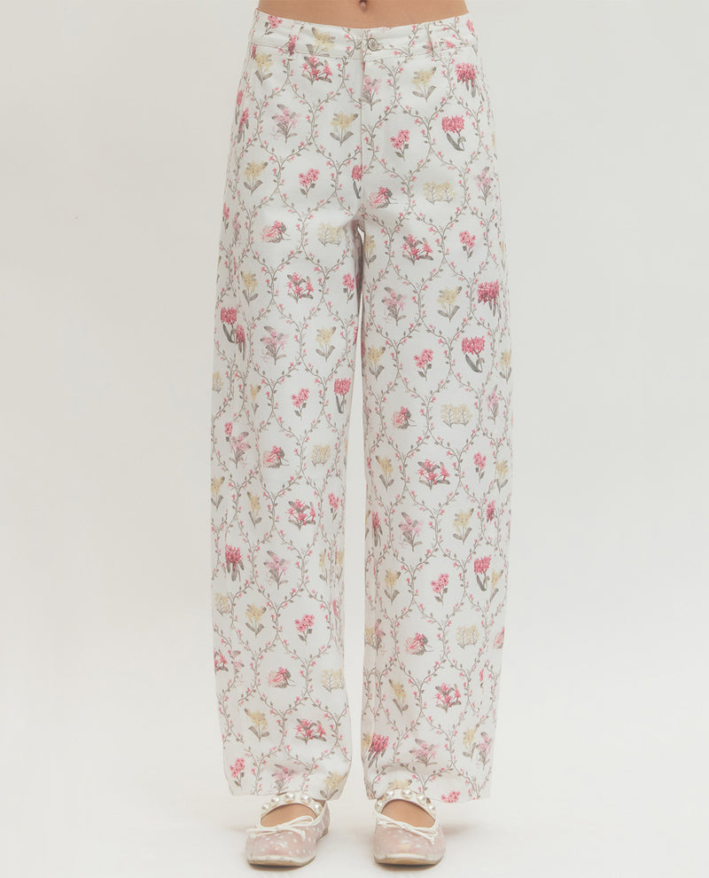 Floral patterned pants on a white background