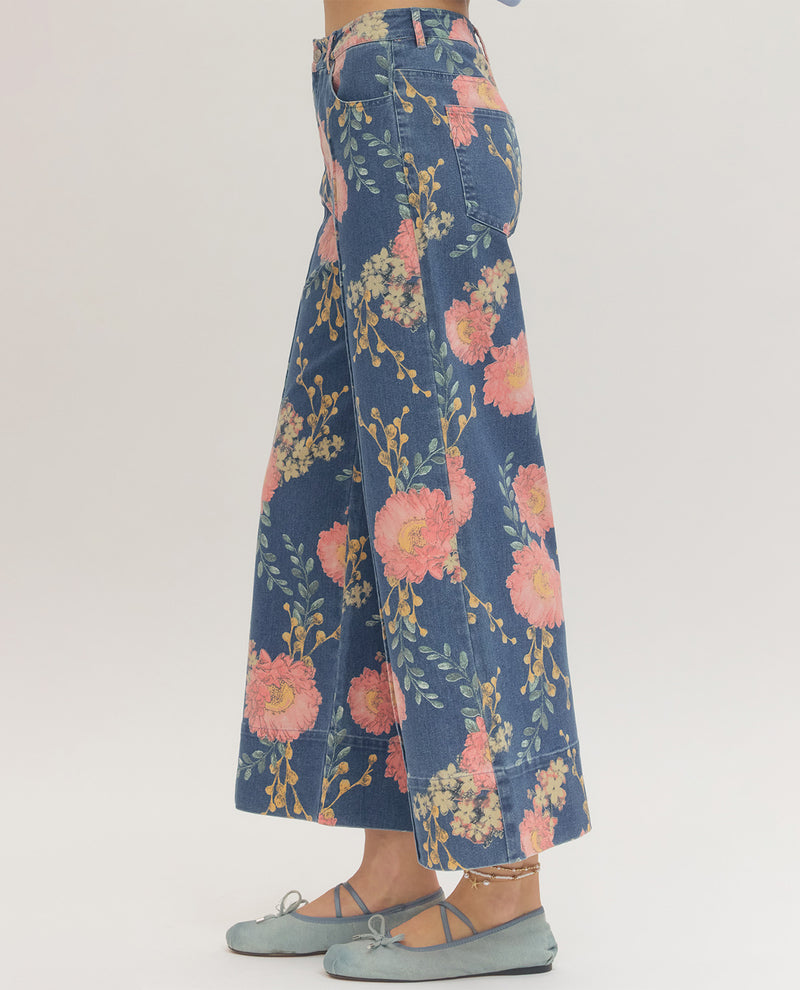 Floral patterned pants on a plain background