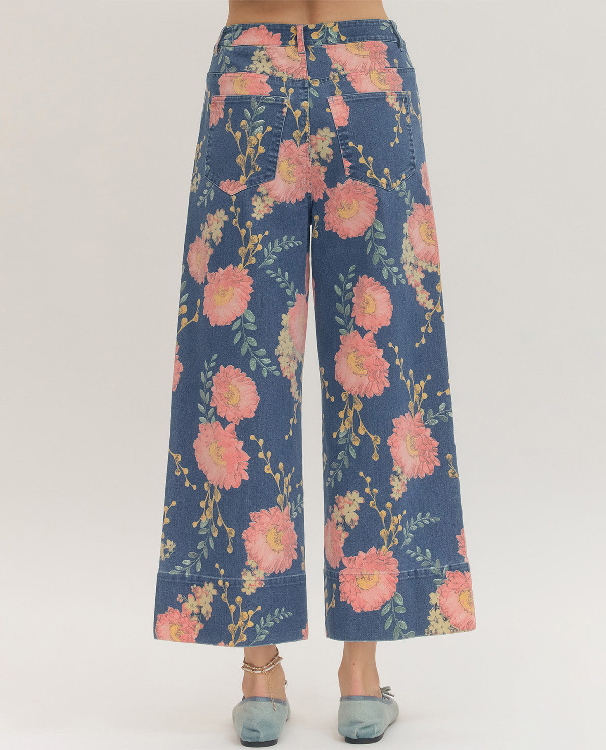 Floral patterned pants on a white background