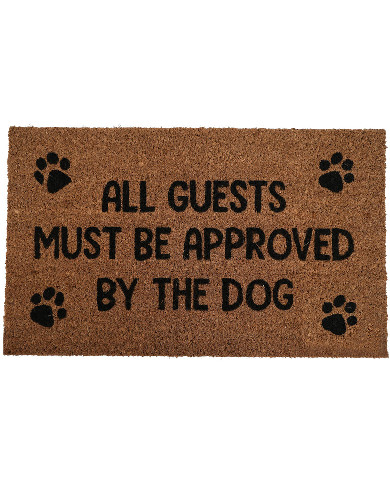 Doormat with text 'All guests must be approved by the dog' and paw prints on a white background