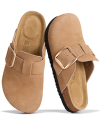 A pair of tan suede clogs with gold-tone buckle straps, shown from the top and side views on a white background.