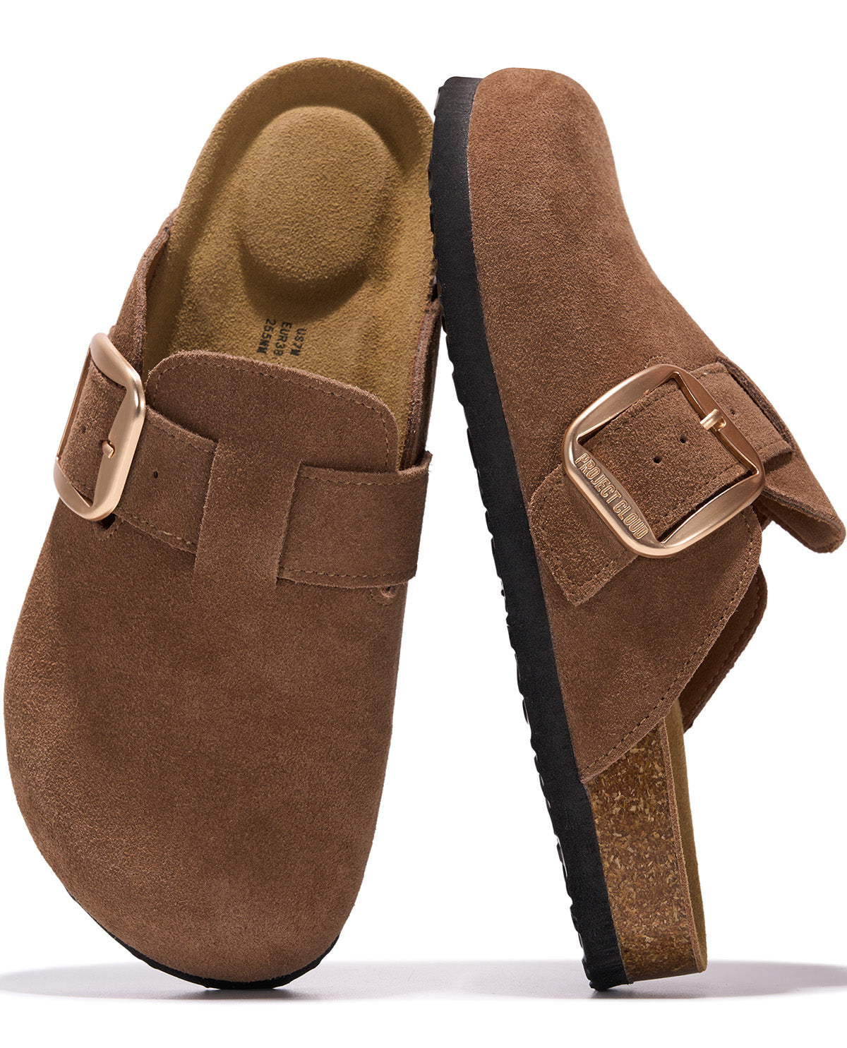 A pair of brown suede clogs with adjustable straps and gold-tone buckles, shown from the top and side views on a white background.
