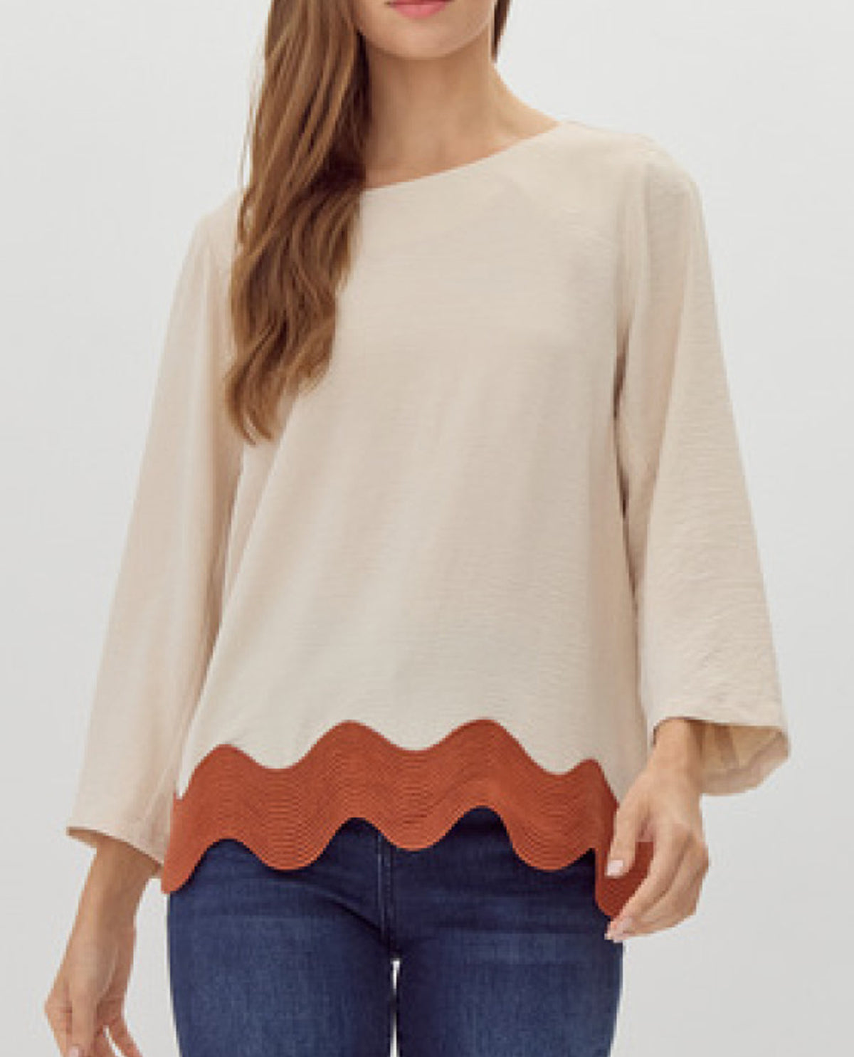 U-Neck Top with Ribbed Swirl Hemline