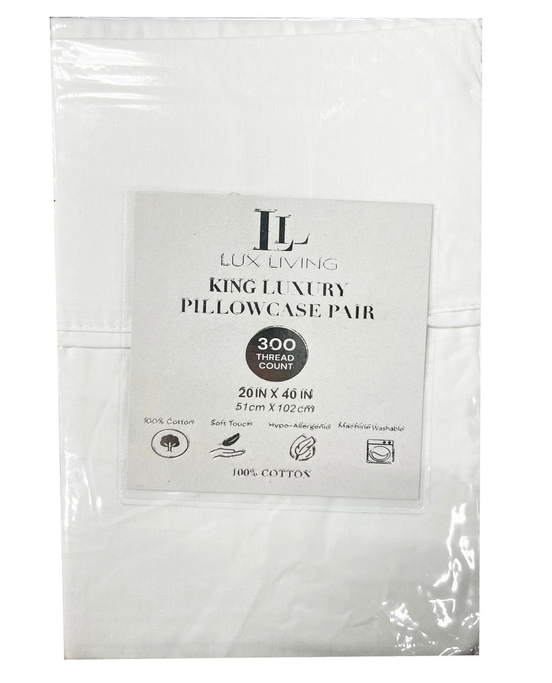 A packaged set of white cotton pillowcases from Lux Living, sealed in a clear plastic bag with a central white label that reads 'King Luxury Pillowcase Pair, 300 thread count, 20 in x 40 in, 100% Cotton'.