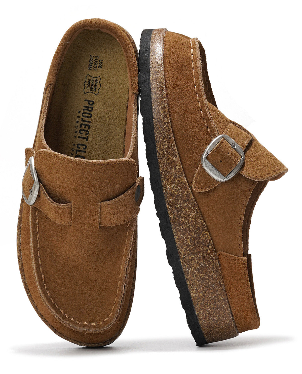 A pair of brown suede slip-on clogs with adjustable buckle straps, shown from the top and side views on a white background. The brand 'Project Clog' is visible on the insole.