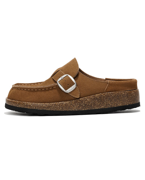 A single brown suede mule shoe with a cork-look midsole and a silver buckle strap, shown in profile against a white background.