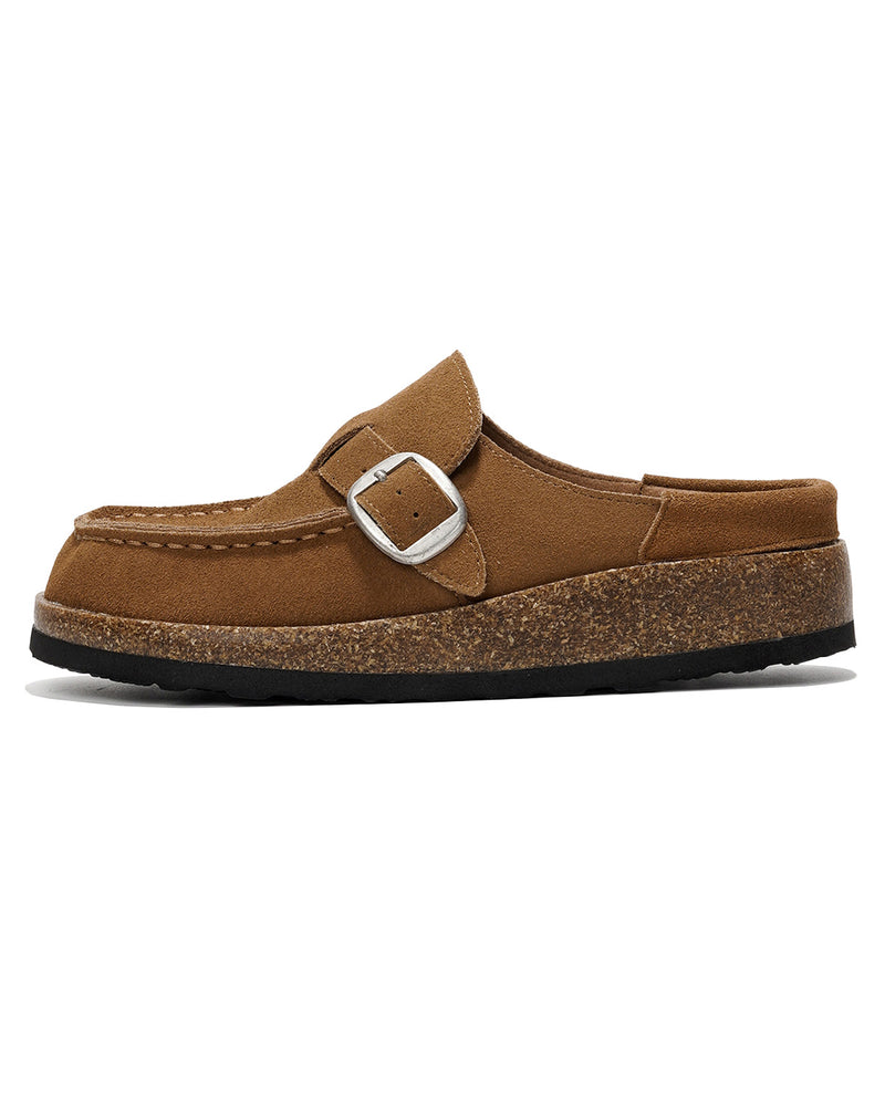 A single brown suede mule shoe with a cork-look midsole and a silver buckle strap, shown in profile against a white background.
