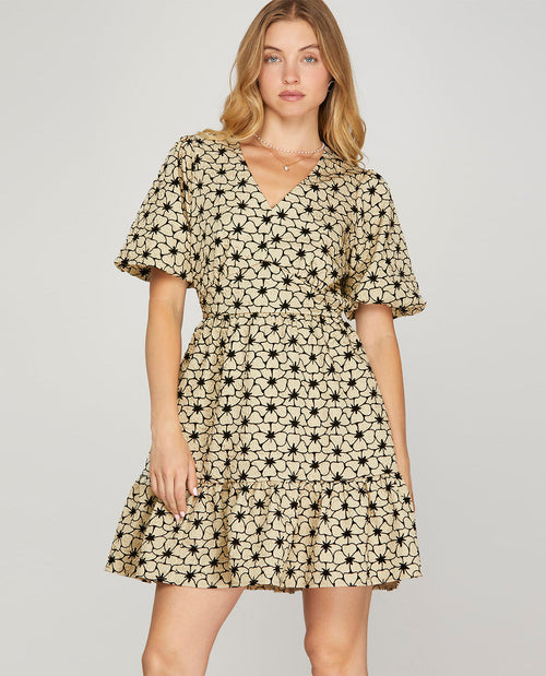 Missy model wearing a short sleeve cream floral mini dress