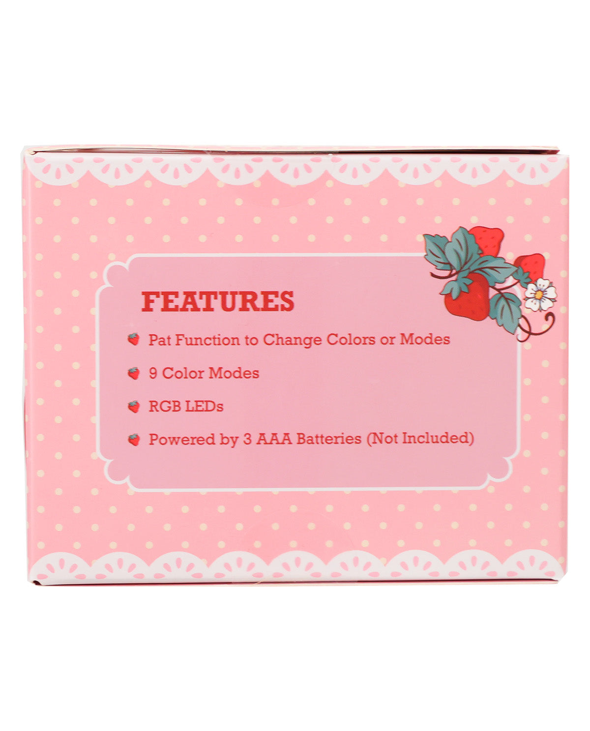 Pink product packaging box with white polka dots, scalloped white borders, and a central label reading 'FEATURES' with bullet points about color modes, RGB LEDs, and battery inclusion. A red strawberry illustration appears in the top right corner.