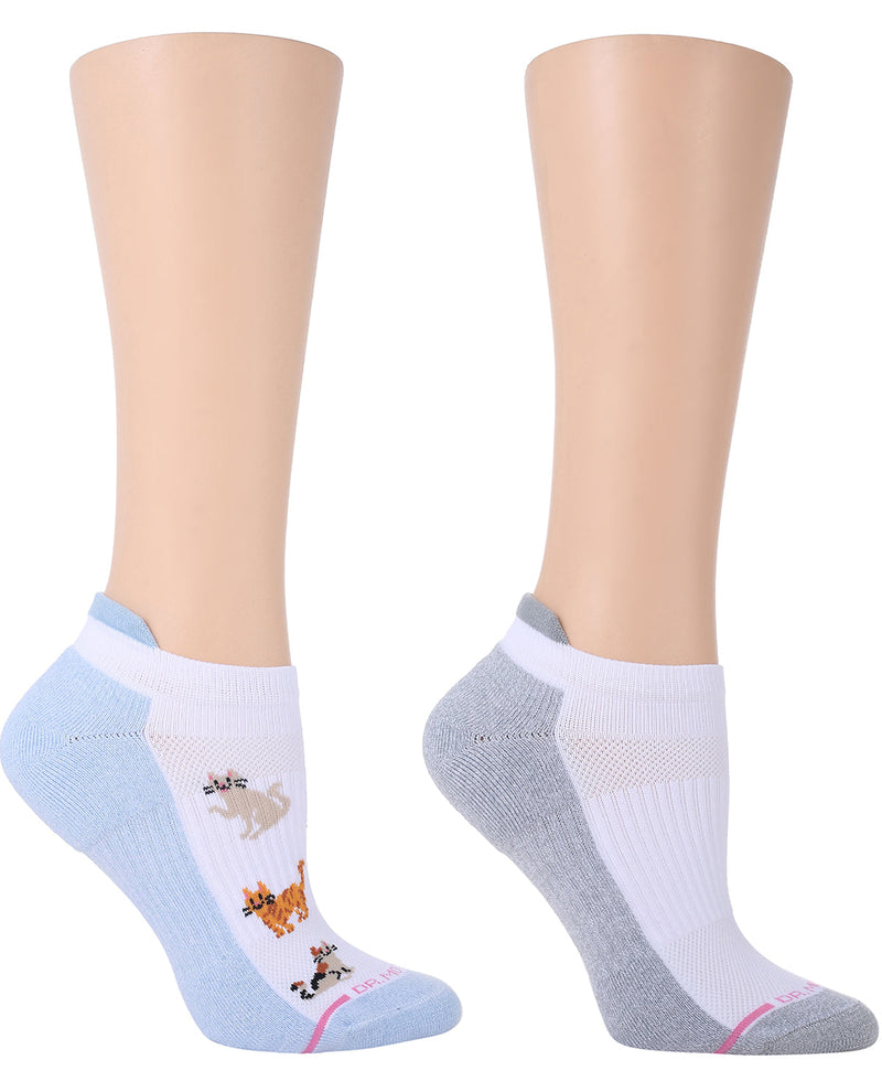 Two pairs of socks on mannequin feet against a white background