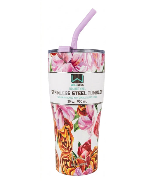 Floral-patterned stainless steel tumbler with a straw on a white background