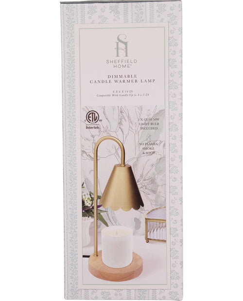 Sheffield Home dimmable candle warmer lamp packaging with gold lamp and white candle.
